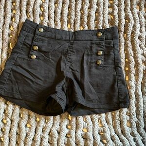 Black button shorts